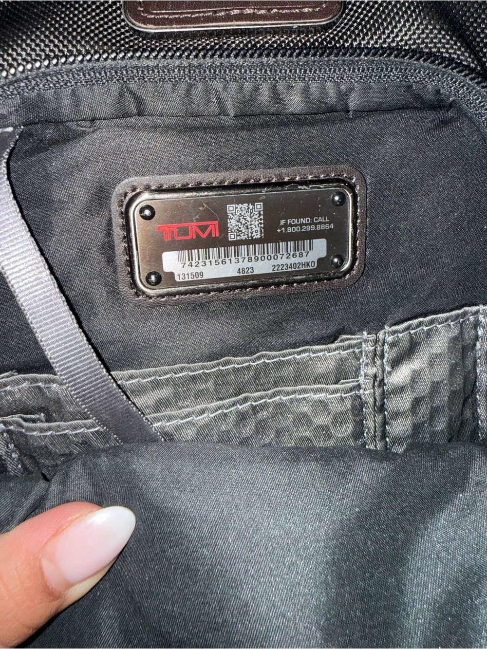 Tumi Black Men's Sling Belt Bag with Silver Hardware